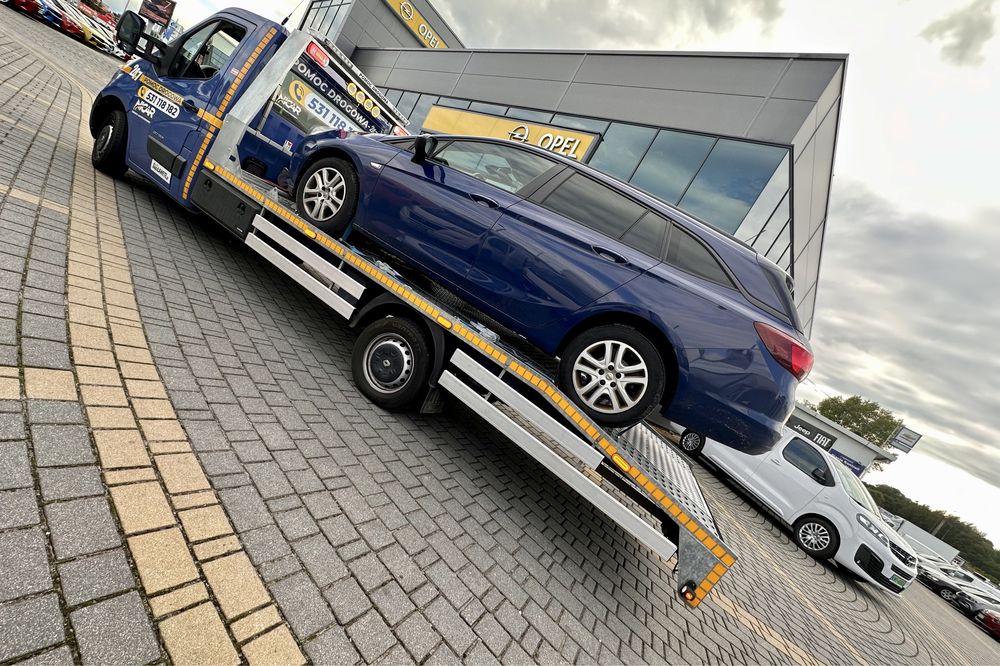 Pomoc drogowa 24/7 laweta, Warszawa, Grodzisk Maz. holowanie  fvat