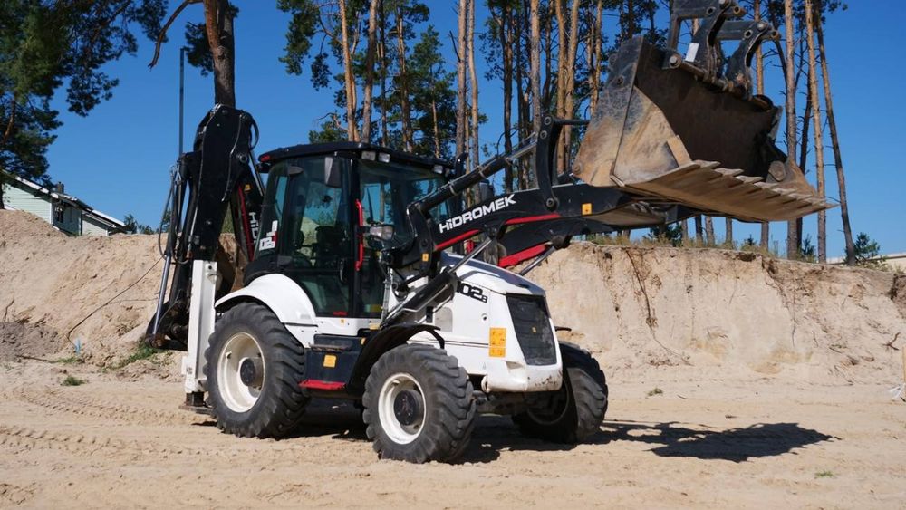 Послуги екскаватора-погрузчика