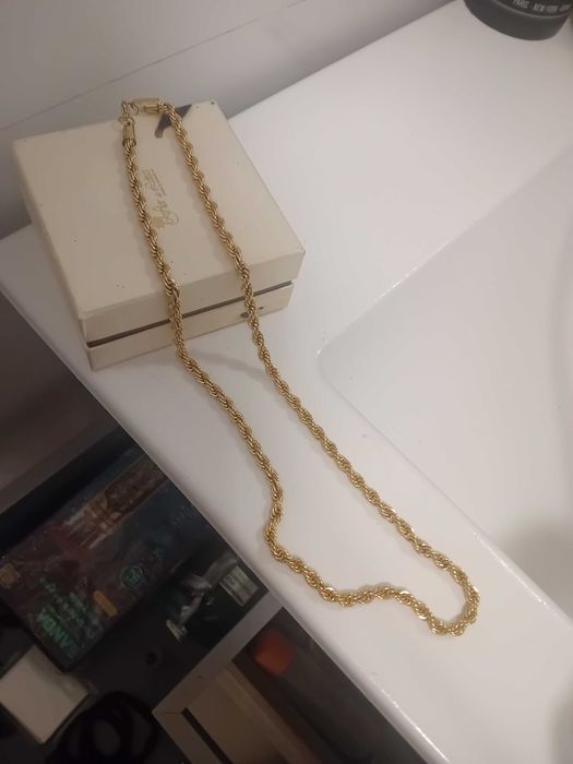 Colar em aço dourado homem