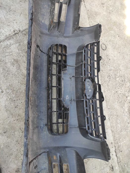 Передній бампер kia Sportage 2 04-08р  865111F050 бампер Кіа спортедж