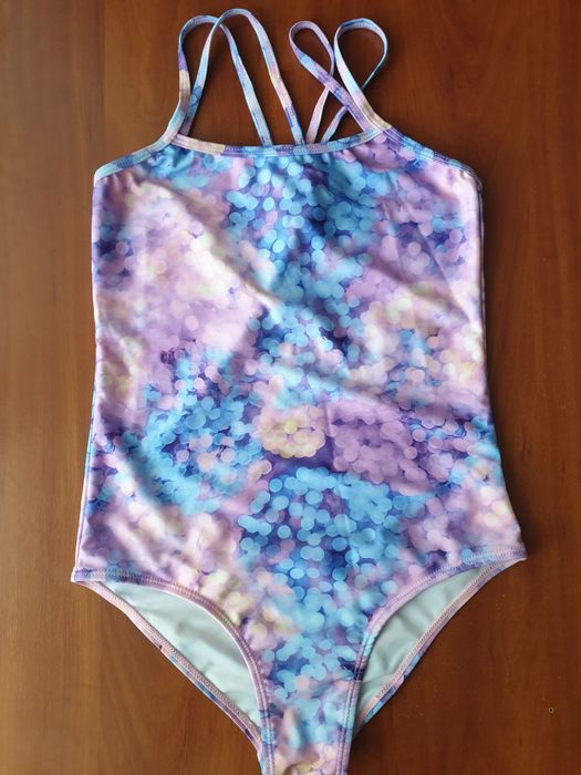 Новый  фирменный купальник 146 см