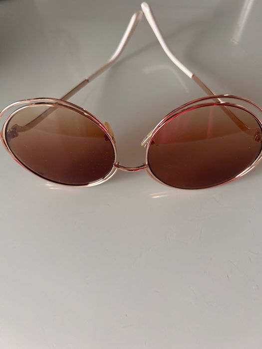 Oculos de sol com aros redondos