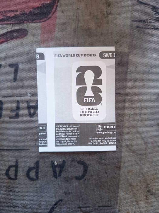 Uma figurinha da copa de 2026 com o recorte mal