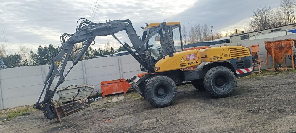 Mecalac 12 mtx 2011 PELNY OSPRZĘT ładna z Niemiec łyżki mlot