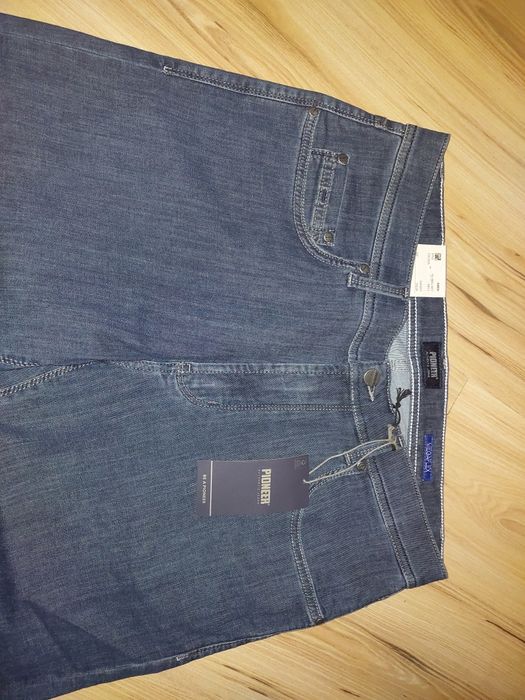 Nowe spodnie jeansowe  rozm.35/34