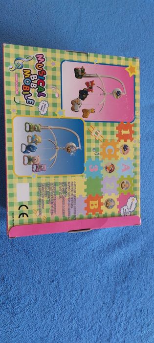 Музична іграшка для дитини в ліжко