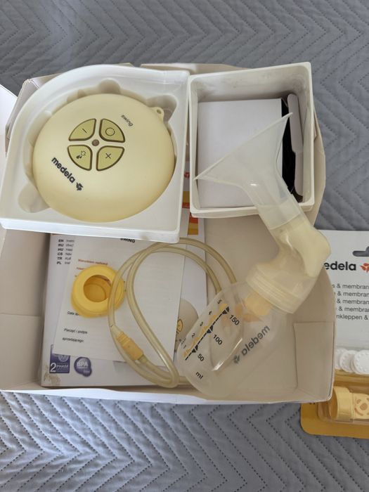 Medela swing електричний молоковідсмоктувач + клапани