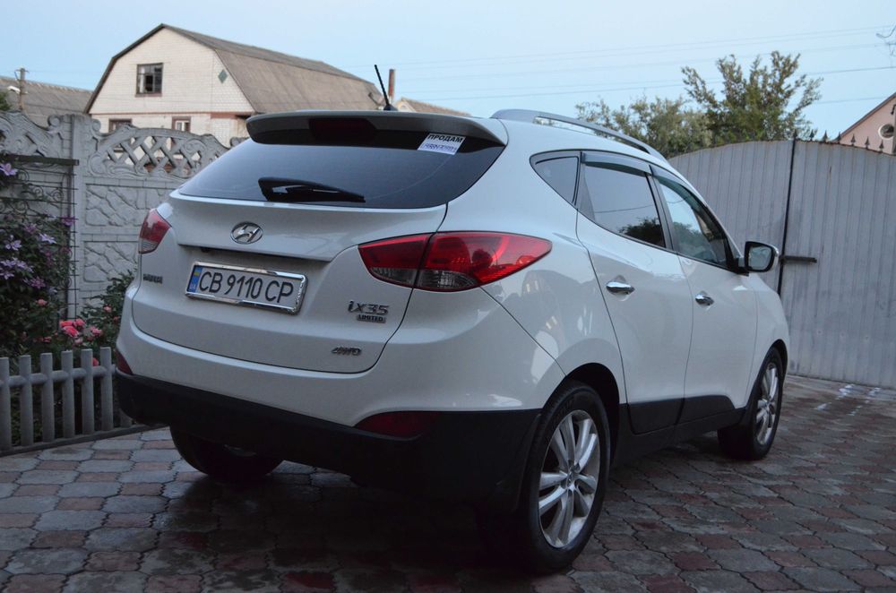 Hyundai ix35 2010 VIN KMHJU81CDBU167650 фото оголошення 7 з 24
