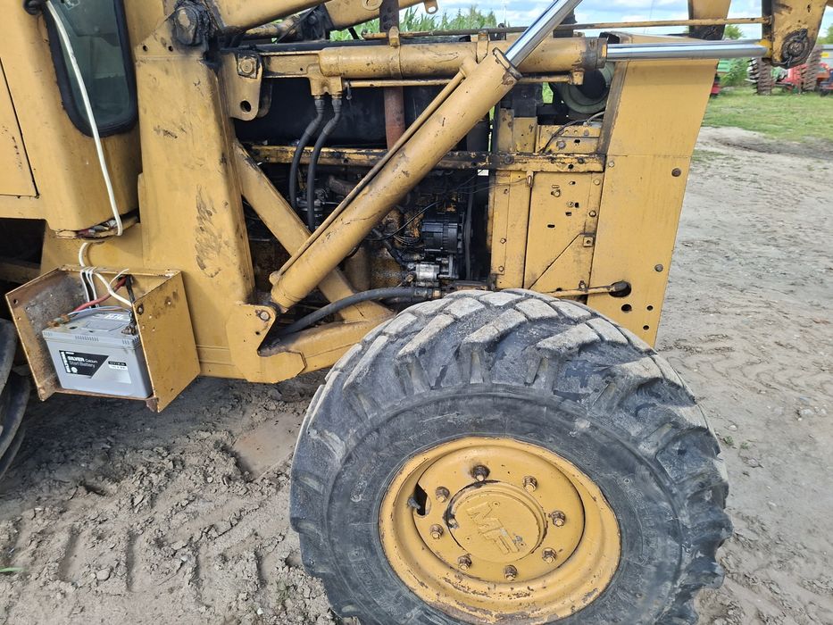 Koparkoladowarka  MF 50HX,  4x4  .