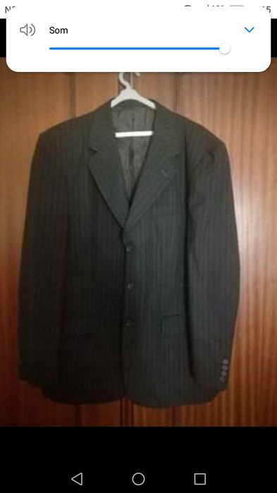 Vendo fato de marca  como novo usado uma única vez