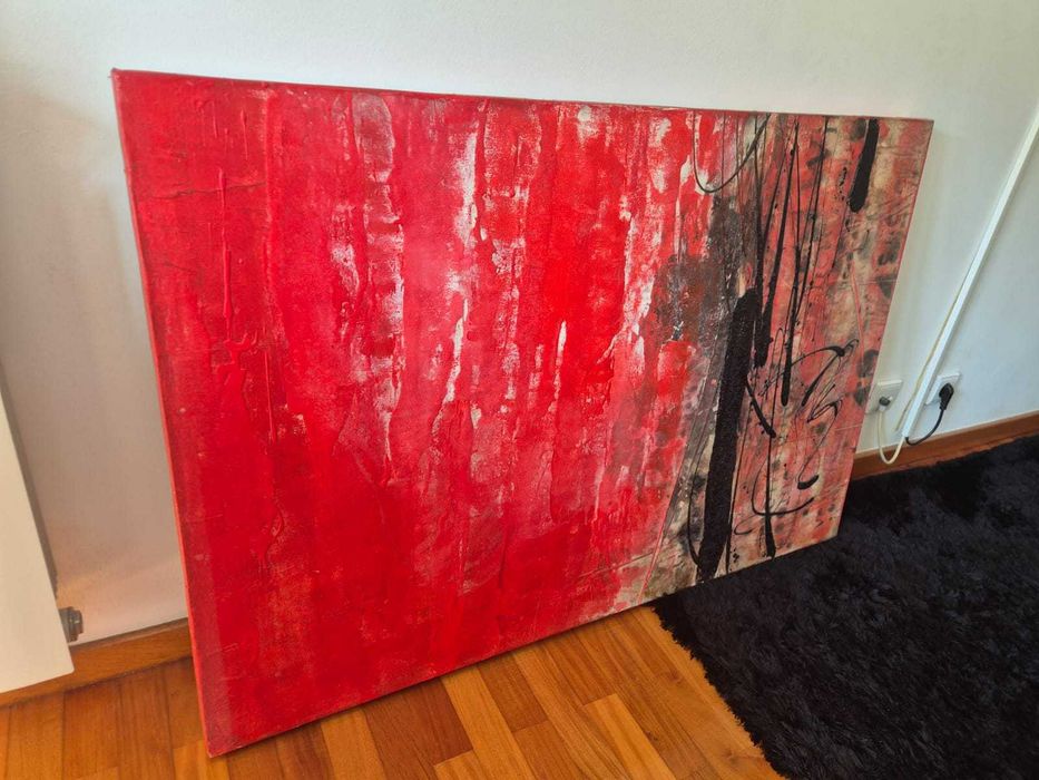 Quadro abstrato em tons de vermelho e preto