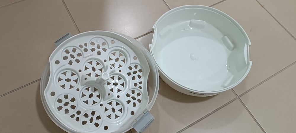 Conjunto esterilizador e aquecedor de biberões