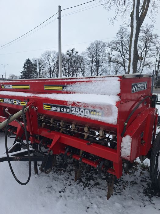 Дискова сівалка SIMULTA 2500 приципна з катками на два бачки