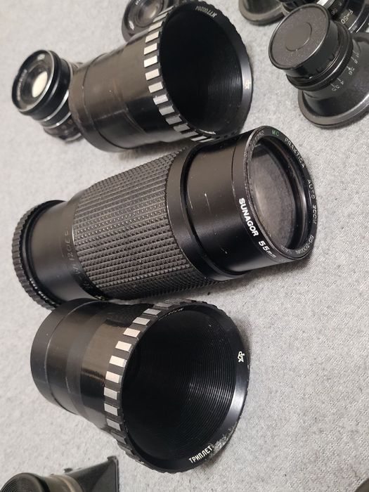 Фотообъективы .         .