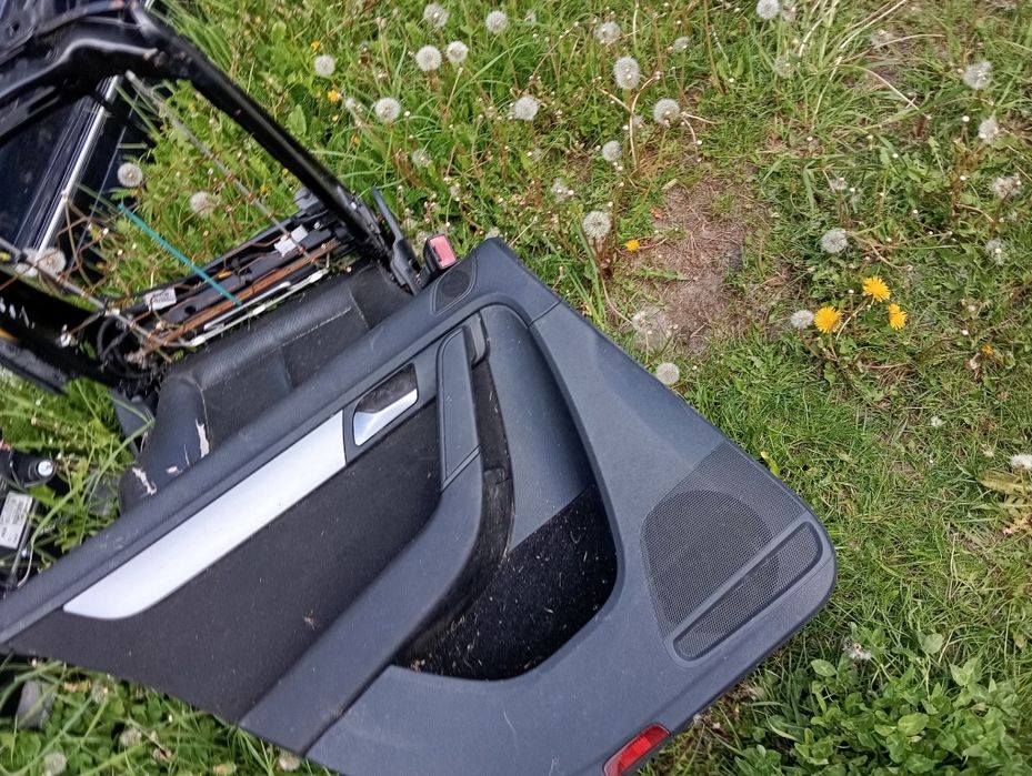 Boczek tapicerka drzwi tył lewy Volkswagen Passat B7 Sedan