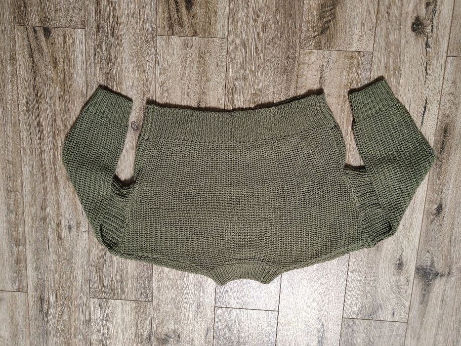 Krótki ażurowy sweter dla dziewczynki rozm 146-152