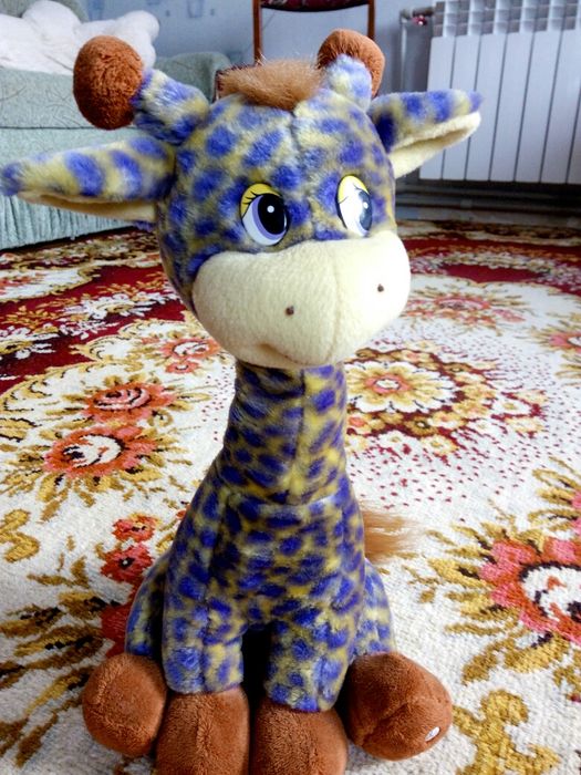 Музыкальная мягкая игрушка «Жирафик»