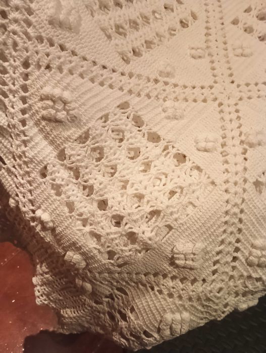 Coberta de renda feita á mão