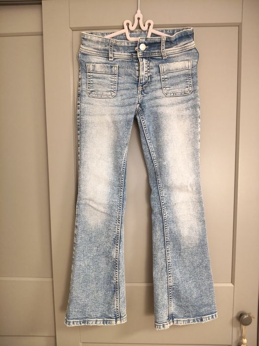 H&M spodnie dla dziewczynki dżinsy dzwony flared leg, 134
