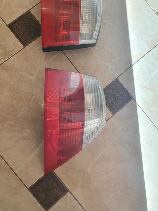 bmw e61 lampy tylne w błotniki przedlift