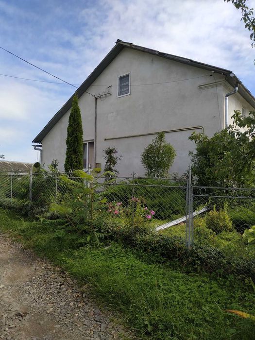 Житловий будинок та земельна ділянка 5,58 сот. м. Перемишляни