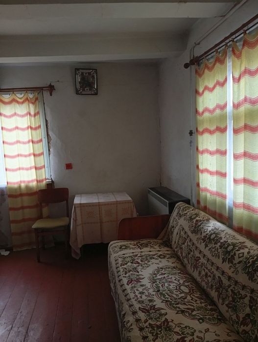 Будинок + дерев'яний гараж на 2 місця