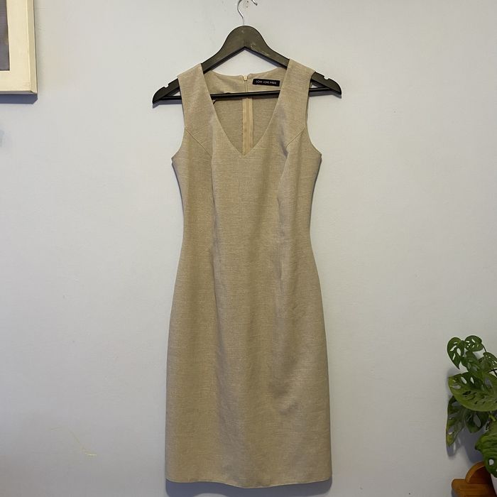 Bezowa dopasowana sukienka midi 36 S bez wad