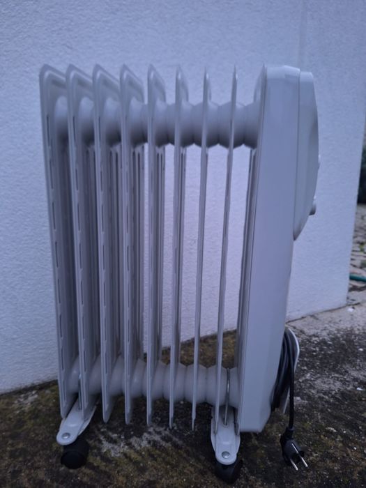 Aquecedor a Óleo Rowenta Intensium – Excelente Estado
Aquecedor a Óleo