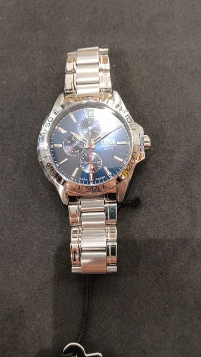 Relógio lotus, como novo