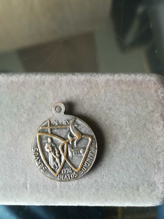 medalha banhada a prata