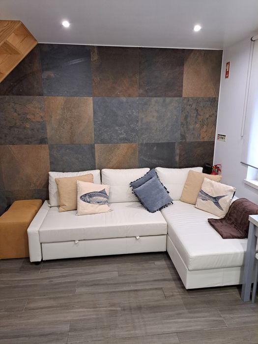 Sofá em pele sintética com Sofá cama