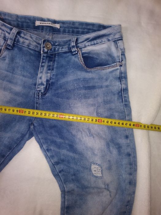 Spodnie jeans 40.        14