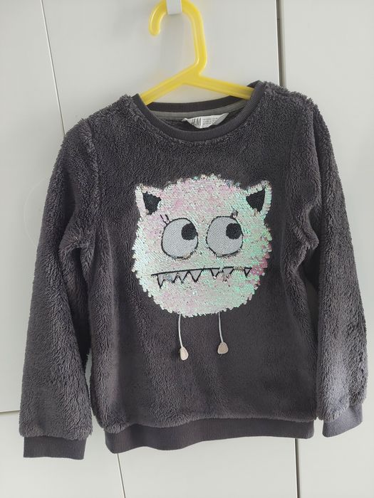 Ciepla bluza brokatowy stworek h&m 122/128