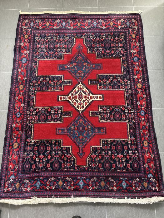 Tapete Persa em bom estado