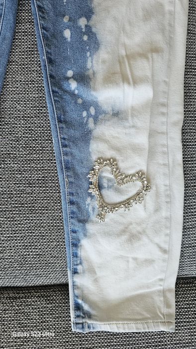 Queen Hearts Paris spodnie jeans damskie L
