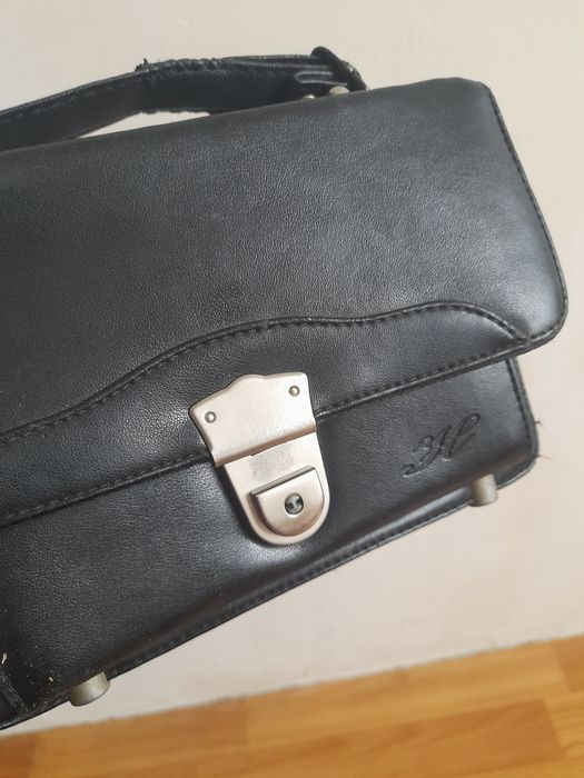 Шкіряні чоловічі сумки/клатчі