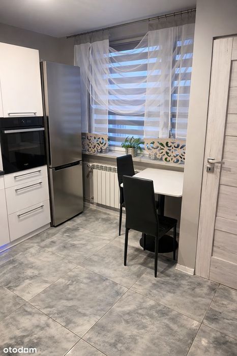 Mieszkanie 77 m² z garażem i działką