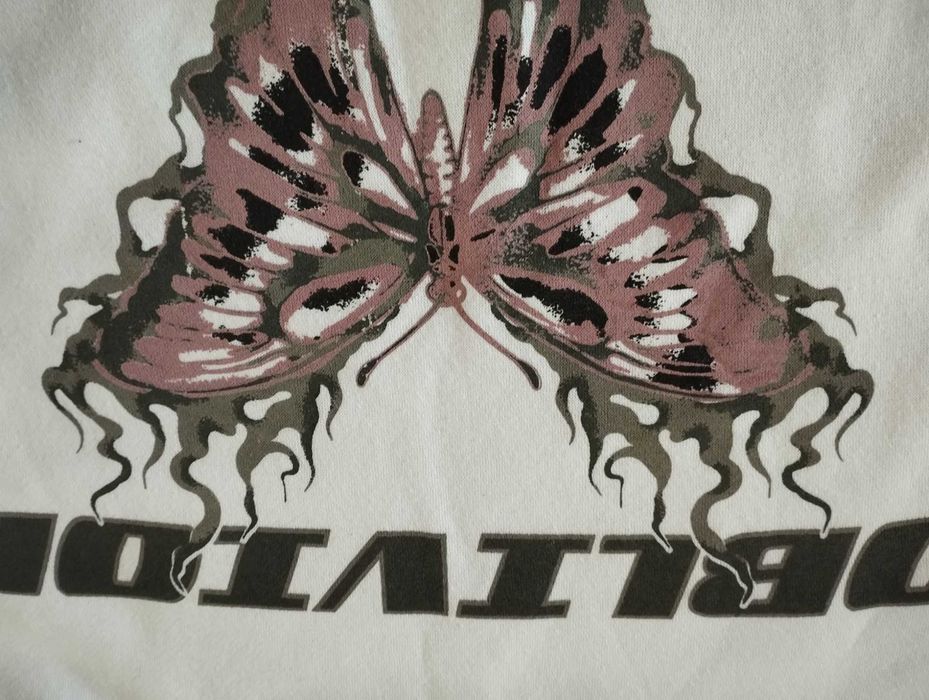 Bluza Cropp s biała z motywami