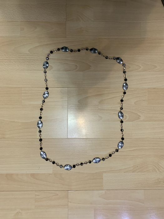 Буси жіночи довжина 135 см.