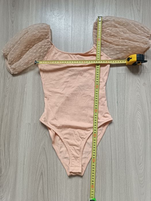 Nowe body damskie z ozdobnymi rękawami