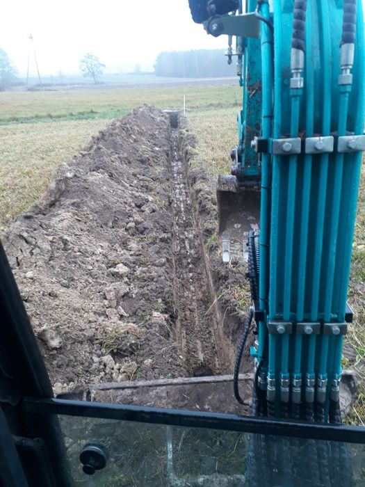 Usługi koparka mini koparką koparko-ładowarką