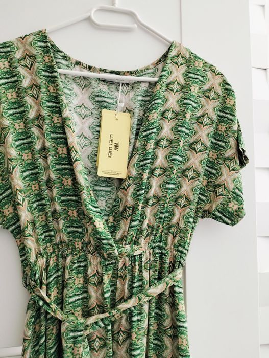 Nowa elegancka sukienka