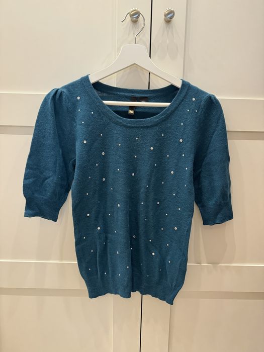 Camisola de malha azul com brilhantes