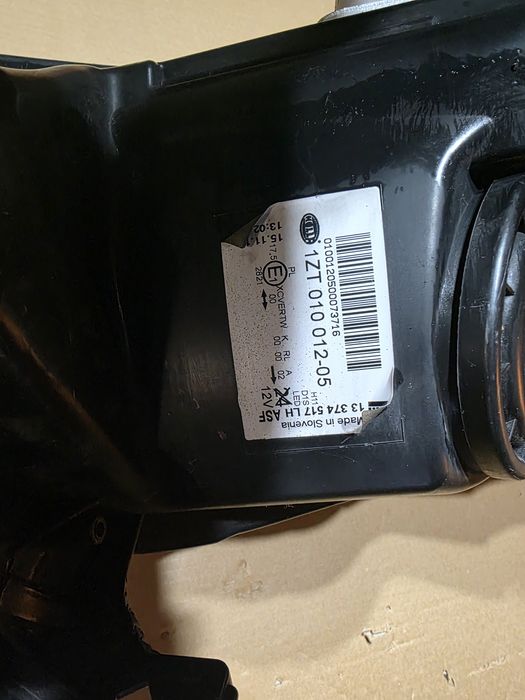 Opel Astra J Lampa przednia 1ZT010012