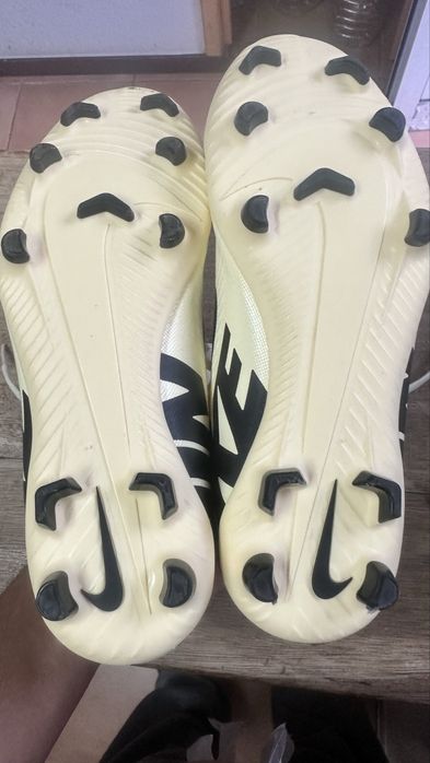 Chuteira nike ….