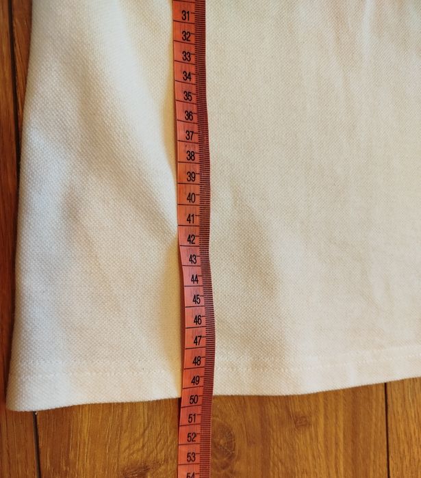 Biała koszulka polo dla chłopca