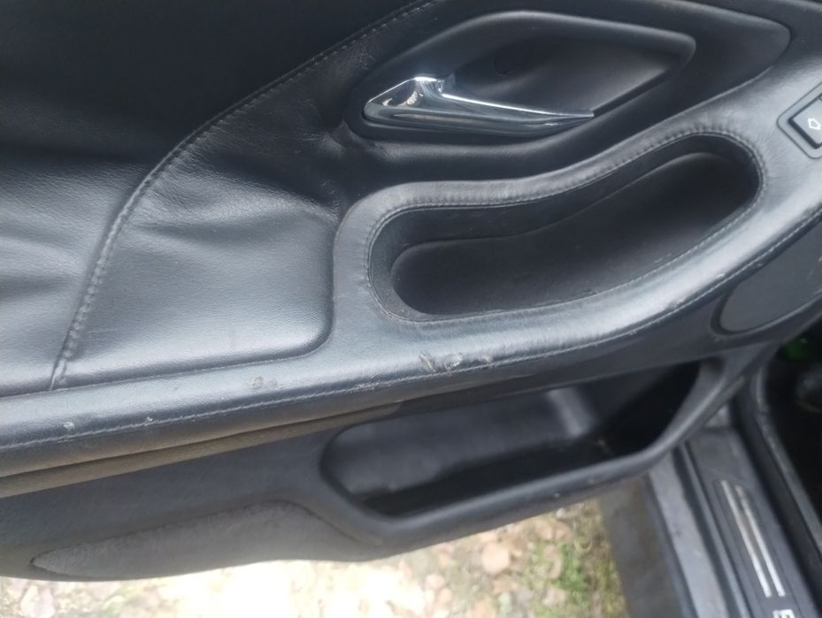 BMW e38 boczki drzwi skóra szyte rączki komplet
