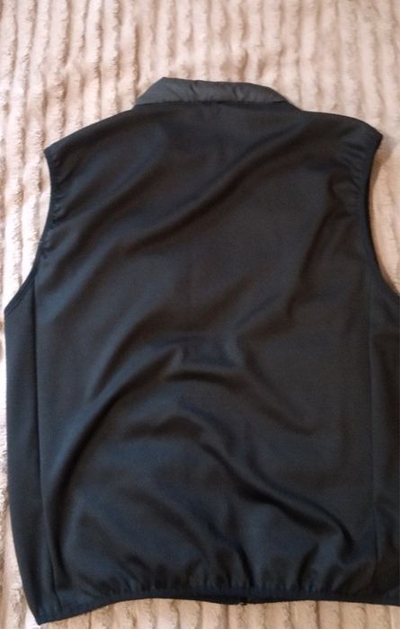 Продам жилетку мужскую