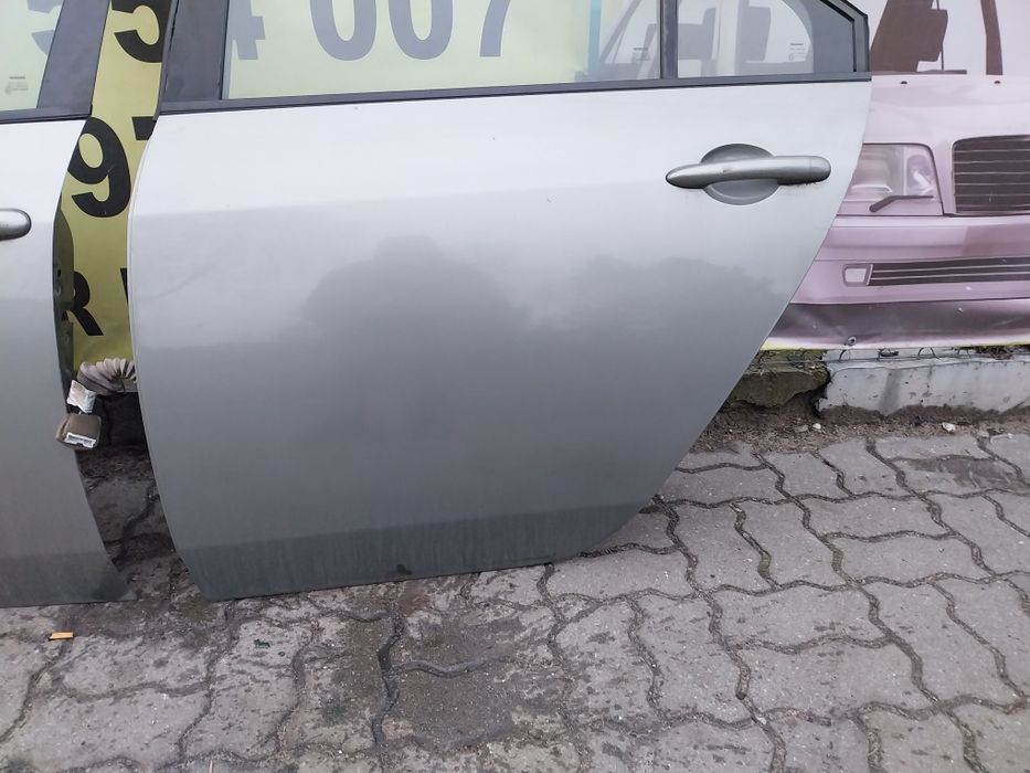 Nissan Primera p12 K30G HB drzwi lewy tył tylne lewe kompletne