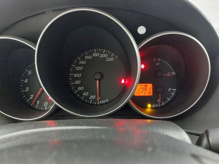 Mazda 1.3 gasolina ano 2005